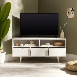 Cara Mid-Century Modern 3 Drawer Corner TV Stand For TVs Up To 58" - Saracina Home 38 Cara Mid-Century Modern 3 Drawer Corner TV Stand For TVs Up To 58" - Saracina Home -Cozy Living Sales Store GUEST 99387a85 c456 4a52 b086 1c507b93c8b5